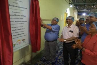 Dignitaries unveil the plaque