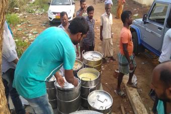 Getting ready for food distribution to cyclone affected residents
