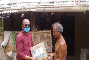Volunteers ensure the materials reach people in need