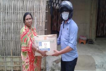 A sigh of relief at receiving an essential grocery box in Tripura