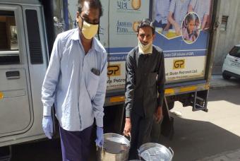 Staff deliver the food